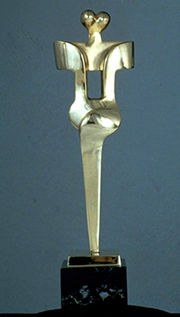 
        Image 1: a <i>Genie Award</i> statuette. Source: Wikimedia Commons. Photo: Tim1357      