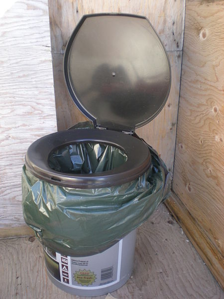 
        Image 1: A latrine using a <i>honey bag</i>. Source: Wikimedia Commons. Photo: CambridgeBayWeather      