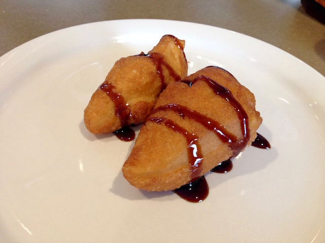 
        Image 1: Deep-fried <i>toutons</i> with molasses. Photo: B. Ford      