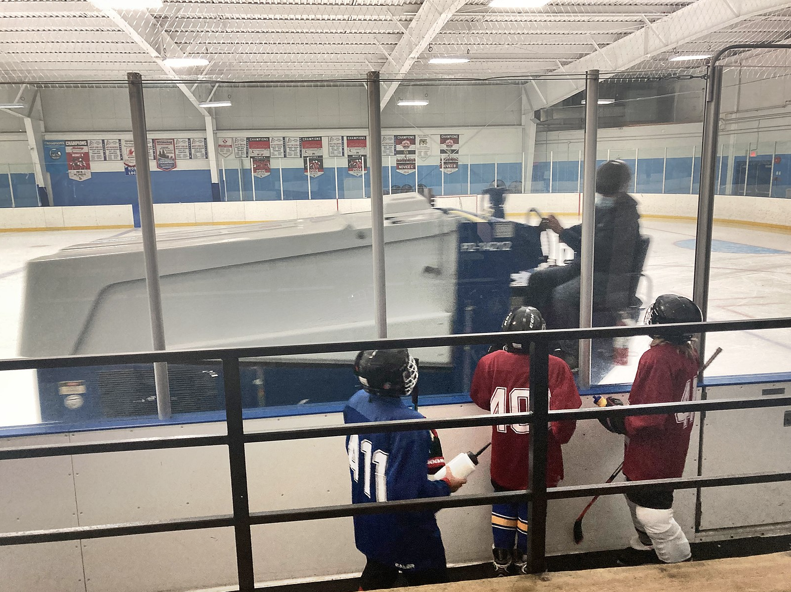 Image 1: A few <i>rink rats</i> waiting to be let onto the ice, 22 Sep. 2021